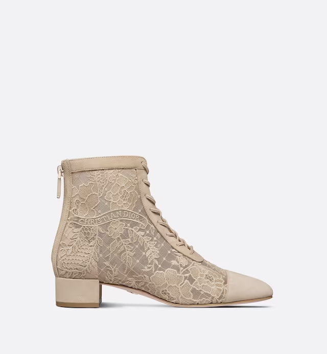 NAUGHTILY-D HEELED ANKLE BOOT